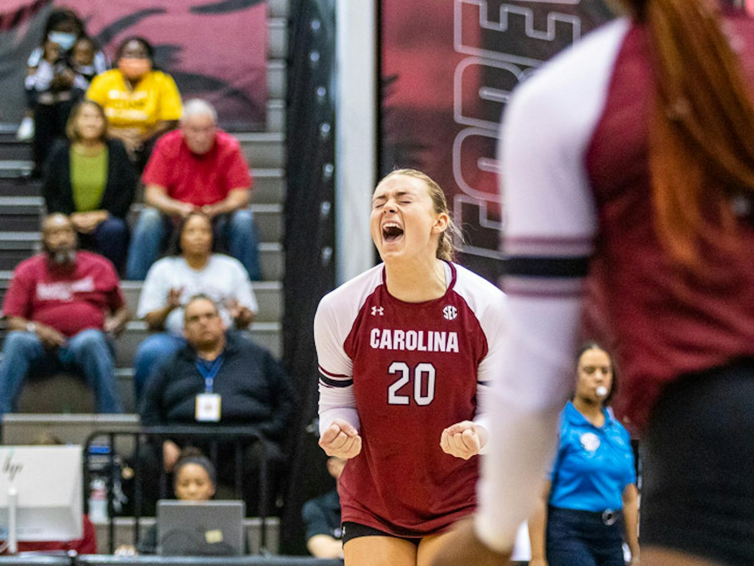 Junior outside hitter Riley Whitesides celebrates after winning a rally on Nov. 6, 2022. The Gamecocks defeated Ole Miss 3-1.&nbsp;