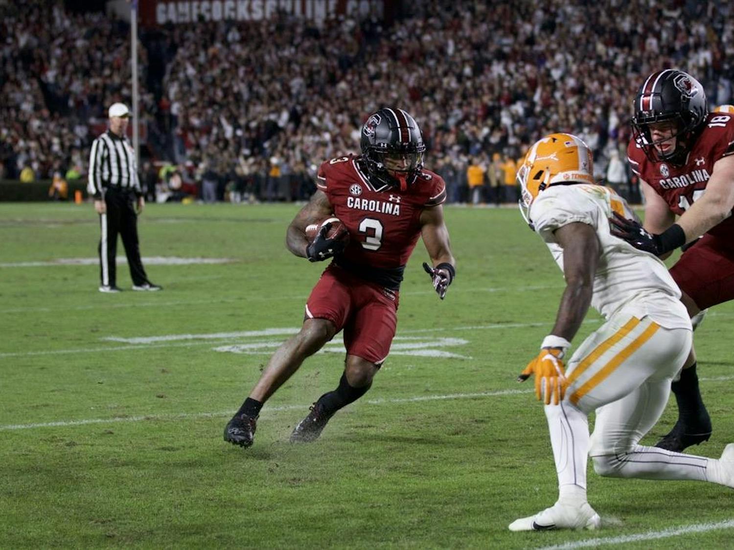 FILE — Senior wide receiver Antwane Wells Jr. runs the ball into the end zone for a South Carolina touchdown, putting the Gamecocks up 42-31. Wells announced Sunday night that he will enter the transfer portal after two seasons with the Gamecocks.