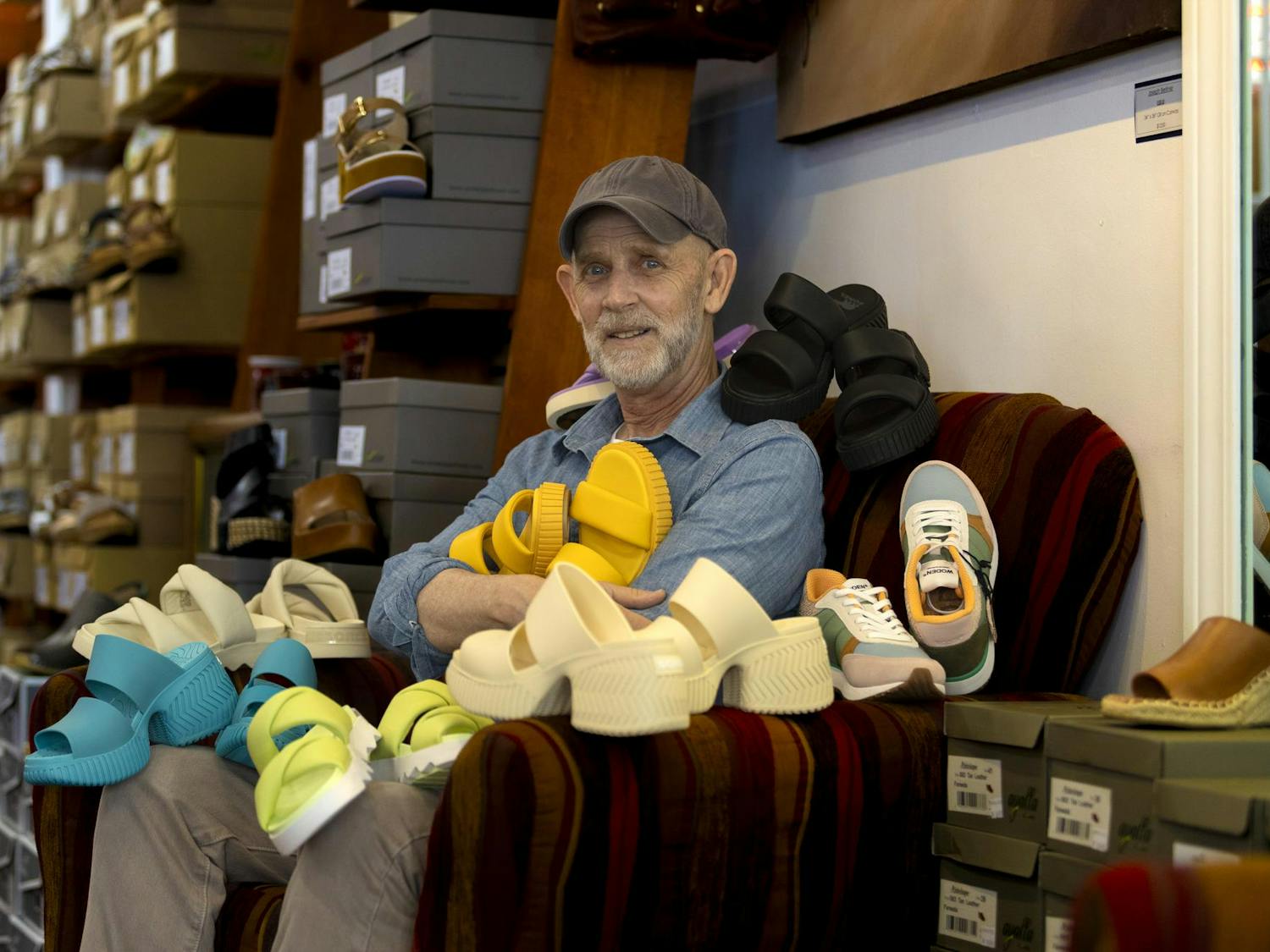 Columbia shoe store owner Kelly Tabor poses with Sorel goods in his store on April 10, 2024. Tabor owns Good for the Sole Shoes &amp; Accessories located at 728 Saluda Ave. in Five Points.