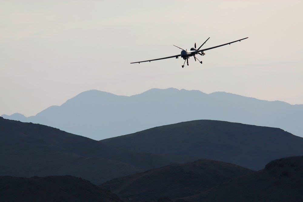 A Reaper drone aircraft comes in for a landing at Creech Air Force Base in Nevada during a training program to bring more pilots online for an expanded use of drones in the skies over Iraq and Afghanistan as well as for missions elsewhere around the world. (Rick Loomis/Los Angeles Times/TNS)