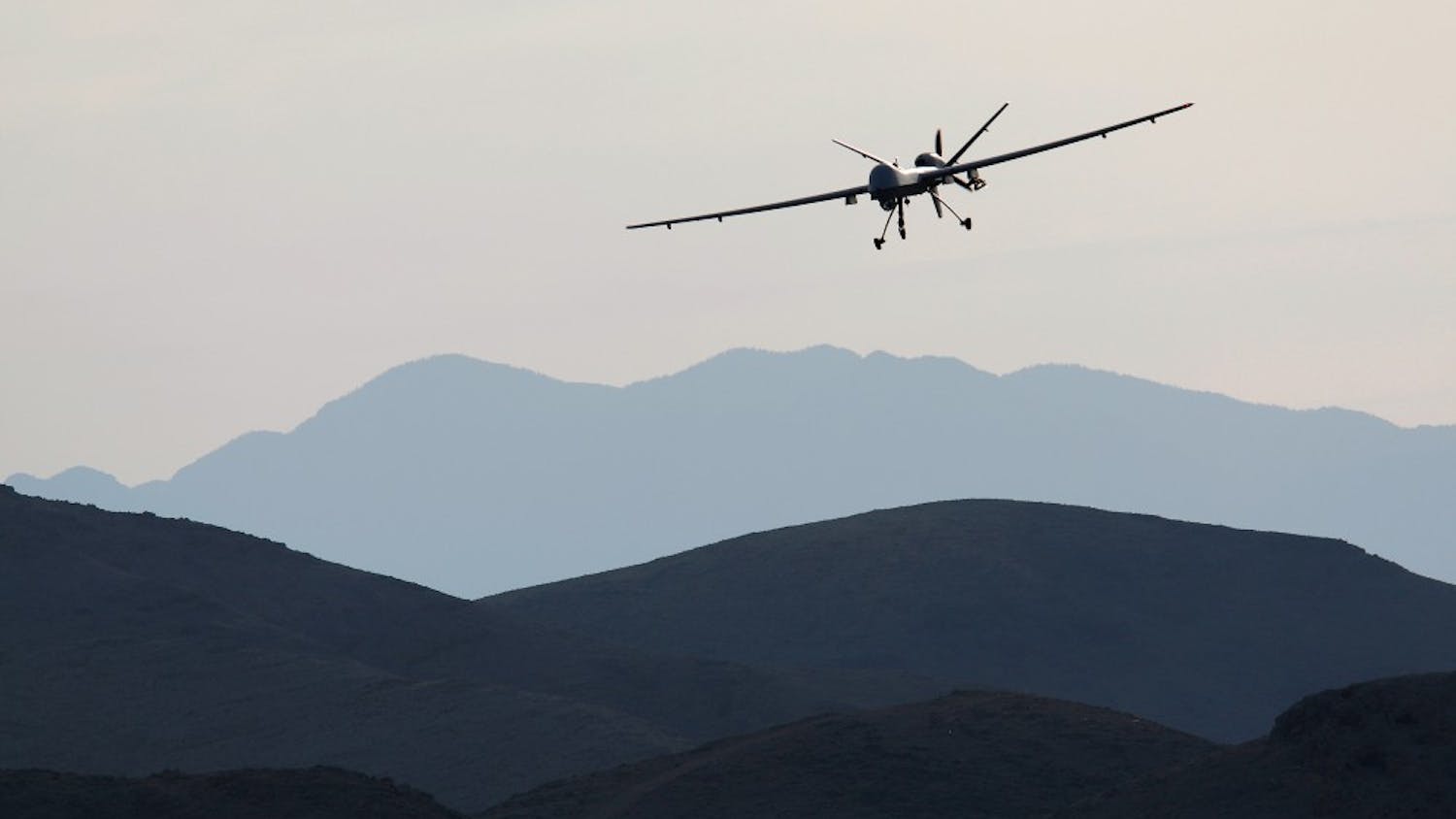 A Reaper drone aircraft comes in for a landing at Creech Air Force Base in Nevada during a training program to bring more pilots online for an expanded use of drones in the skies over Iraq and Afghanistan as well as for missions elsewhere around the world. (Rick Loomis/Los Angeles Times/TNS)
