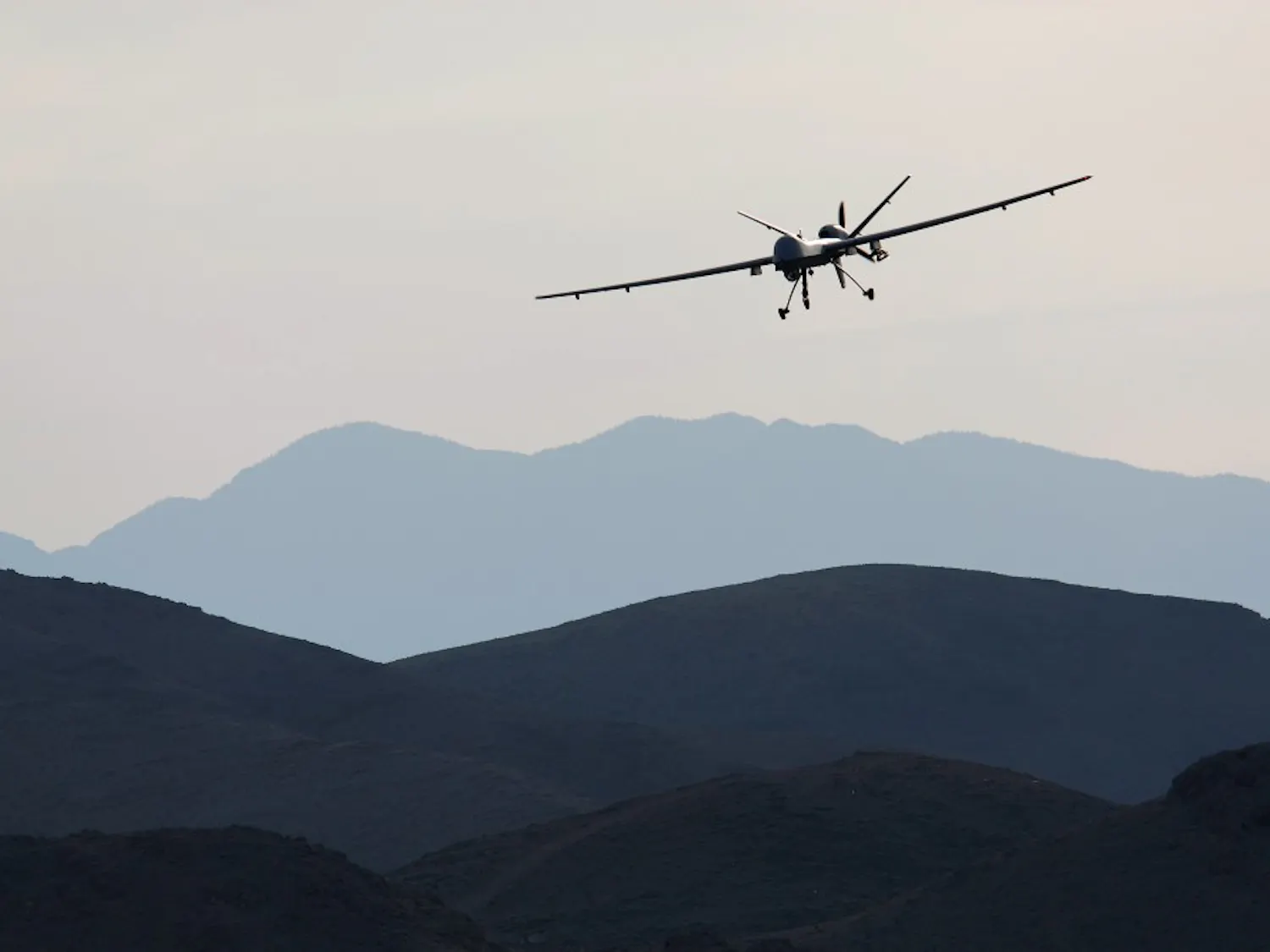 A Reaper drone aircraft comes in for a landing at Creech Air Force Base in Nevada during a training program to bring more pilots online for an expanded use of drones in the skies over Iraq and Afghanistan as well as for missions elsewhere around the world. (Rick Loomis/Los Angeles Times/TNS)