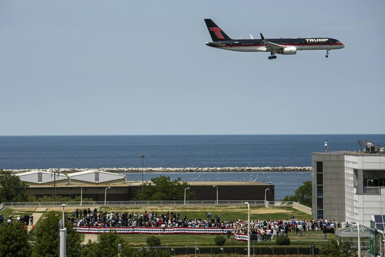 Donald Trump arrives in his airplane as he flies over a campaign rally at the Great Lakes Science Center during the Republican National Convention in Cleveland on Wednesday, July 20, 2016. (Marcus Yam/Los Angeles Times/TNS)