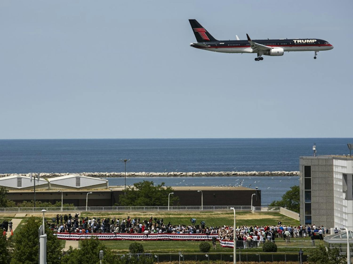 Donald Trump arrives in his airplane as he flies over a campaign rally at the Great Lakes Science Center during the Republican National Convention in Cleveland on Wednesday, July 20, 2016. (Marcus Yam/Los Angeles Times/TNS)