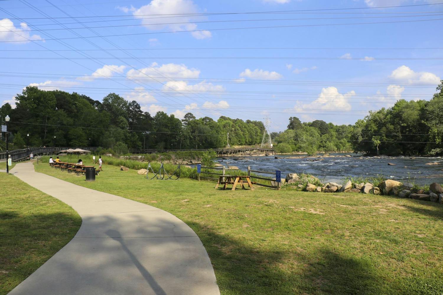 A view of the Saluda River and the trail running alongside it at 680 Candi Lane on April 20, 2024. Alongside a portion of the trail will be PickleGraden on the River, a new pickleball and biergarten development.