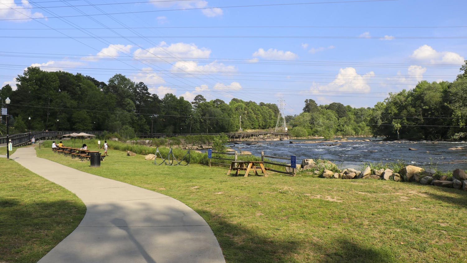 A view of the Saluda River and the trail running alongside it at 680 Candi Lane on April 20, 2024. Alongside a portion of the trail will be PickleGraden on the River, a new pickleball and biergarten development.
