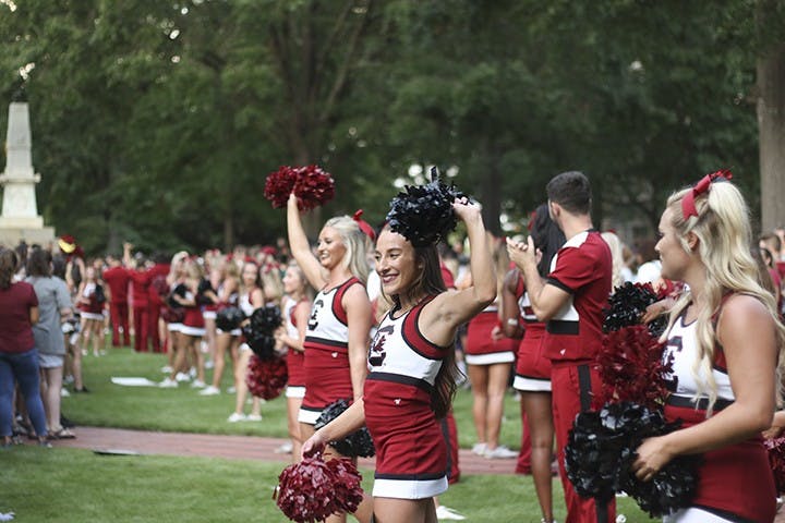 Gamecock cheerleaders rally students during "First Night Carolina" on the horseshoe, Wednesday. 