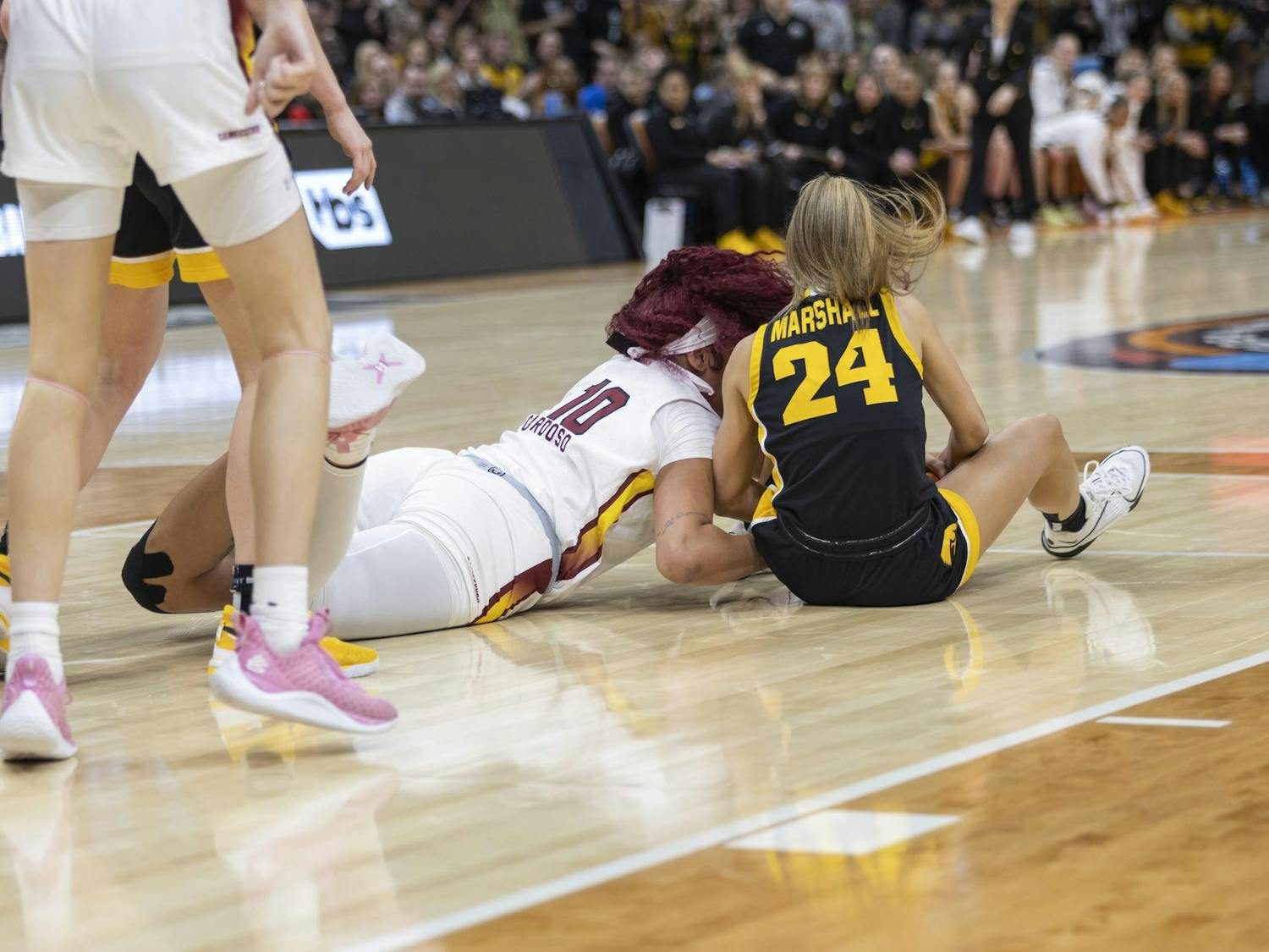 Gamecock senior center Kamilla Cardoso and Hawkeye fifth-year guard Gabbie Marshall fight for the ball during the the national championship game on April 7, 2024. Marshall tallied three steals for the Hawkeyes during the team's second consecutive loss in the championship game.
