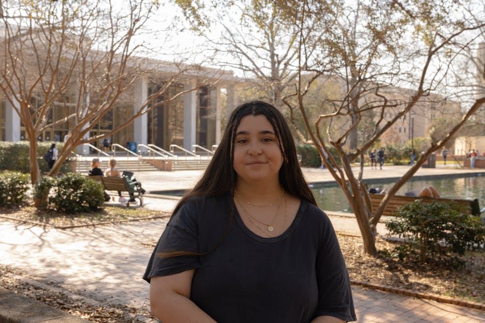 <p>Julia Goulet, the opinion editor of The Daily Gamecock, poses in front of Thomas Cooper Library on Feb. 26, 2023. Goulet has struggled with her mental health for years and advocates for being able to be more open about personal struggles.&nbsp;</p>