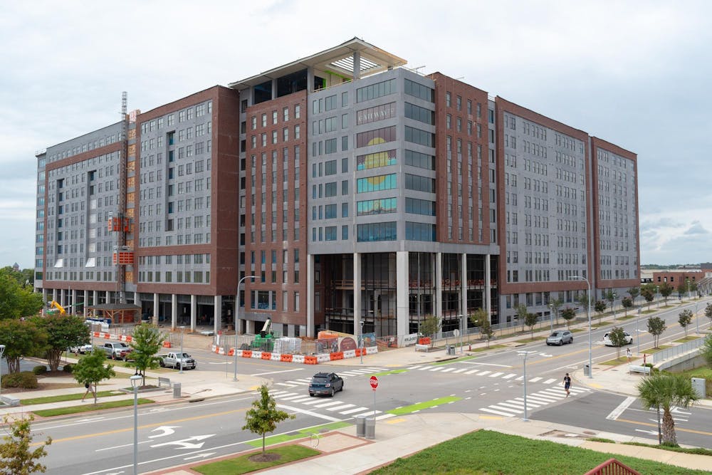 <p>View of the new Gateway 737 building as students and Columbia residents cross Greene Street on Sept. 16, 2024. The building is a student housing complex slated to open in the fall of 2025.</p>