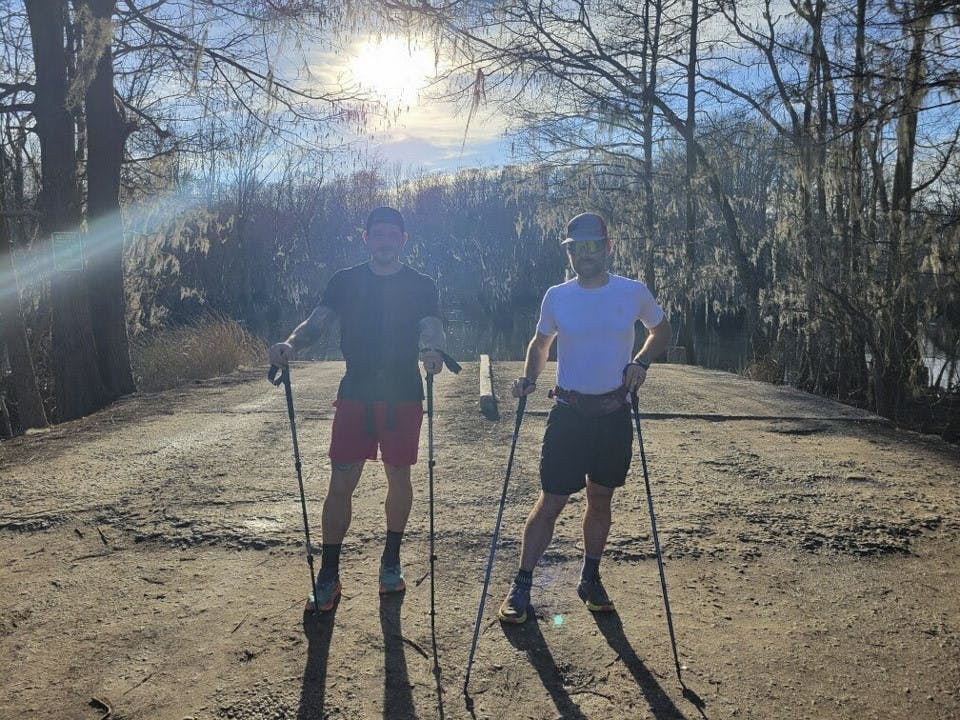 Sean Clayton (on left) and Nathan Frantz (on right) pose on a ridge along the Palmetto Trail. The duo ran the 350-mile trail in a record 10 days, 11 hours and 24 minutes over winter break.&nbsp;
