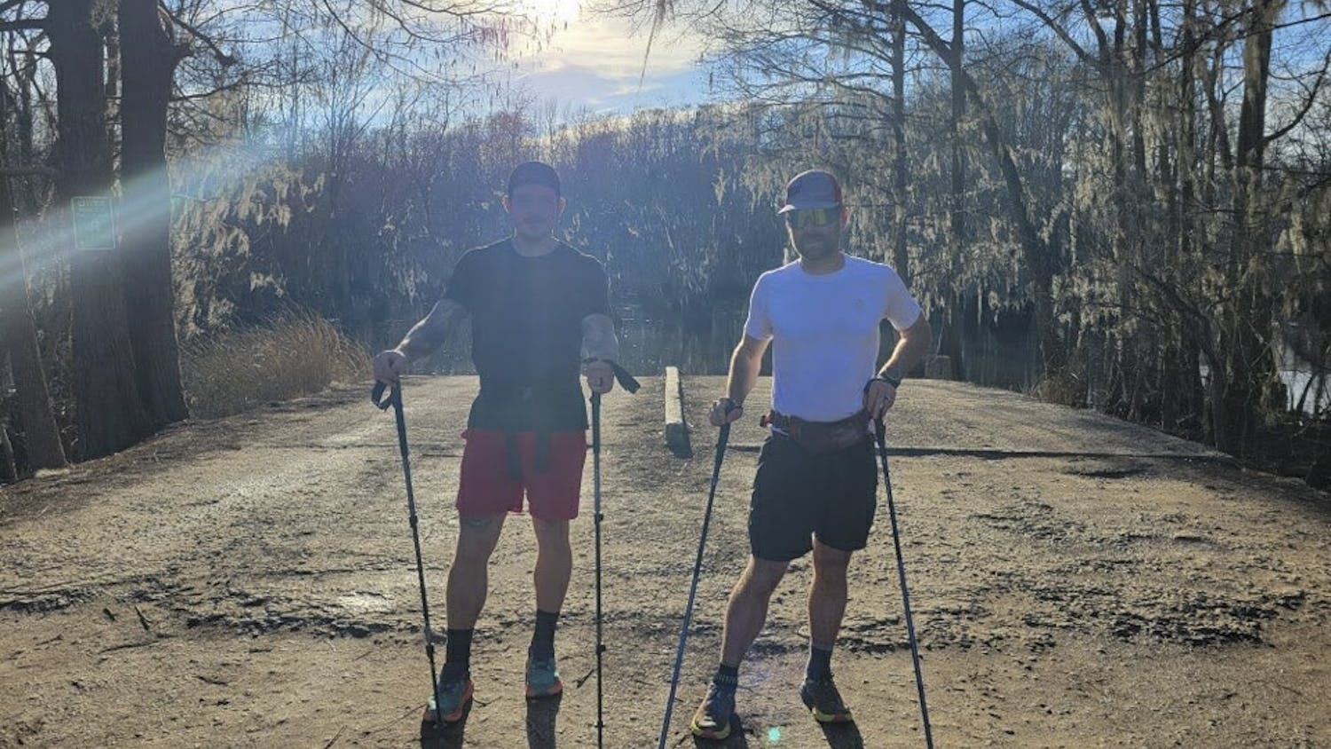 Sean Clayton (on left) and Nathan Frantz (on right) pose on a ridge along the Palmetto Trail. The duo ran the 350-mile trail in a record 10 days, 11 hours and 24 minutes over winter break.&nbsp;