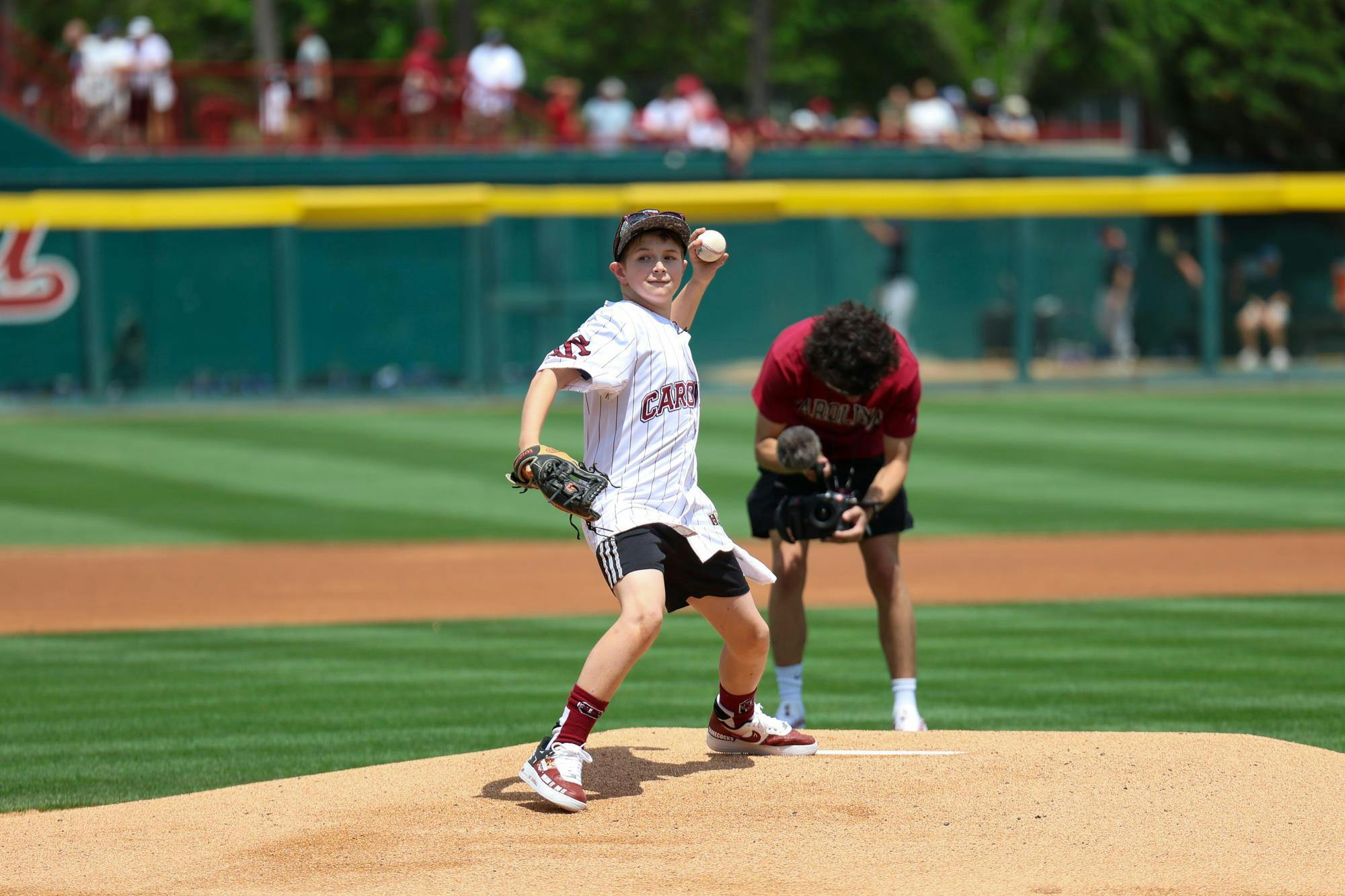 Lexington resident Gabriel Lyons throws the ceremonial first pitch before the South Carolina baseball team faces off against Kentucky on April 25, 2026. Lyons, a super-fan of the Gamecocks, was given the opportunity to throw the first pitch and tour the Gamecock athletics facilities as part of a dream day planned by Dream on 3.