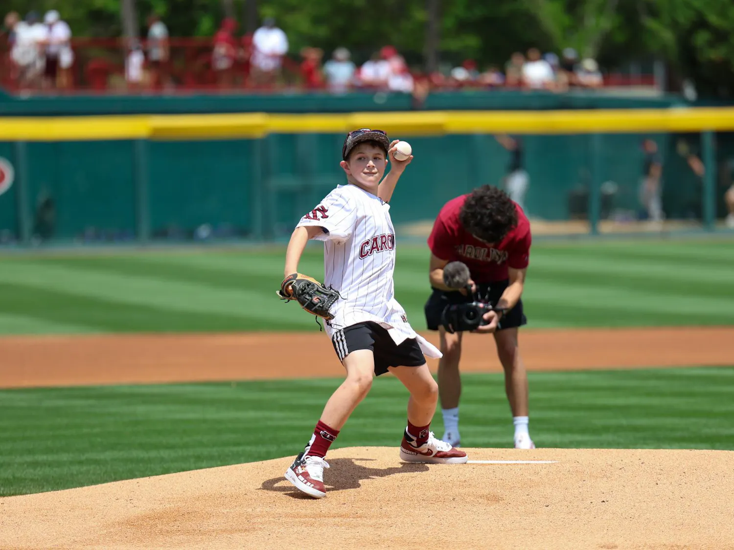 Lexington resident Gabriel Lyons throws the ceremonial first pitch before the South Carolina baseball team faces off against Kentucky on April 25, 2026. Lyons, a super-fan of the Gamecocks, was given the opportunity to throw the first pitch and tour the Gamecock athletics facilities as part of a dream day planned by Dream on 3.