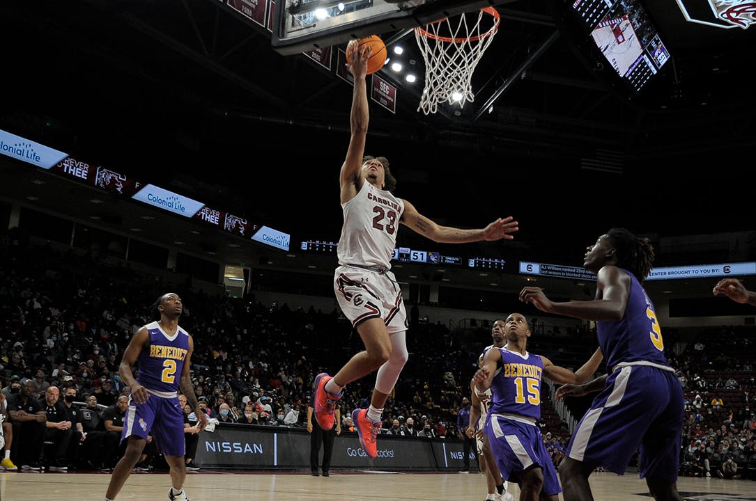 Freshman guard Devin Carter lays-up the ball in the second half against the Benedict Tigers.