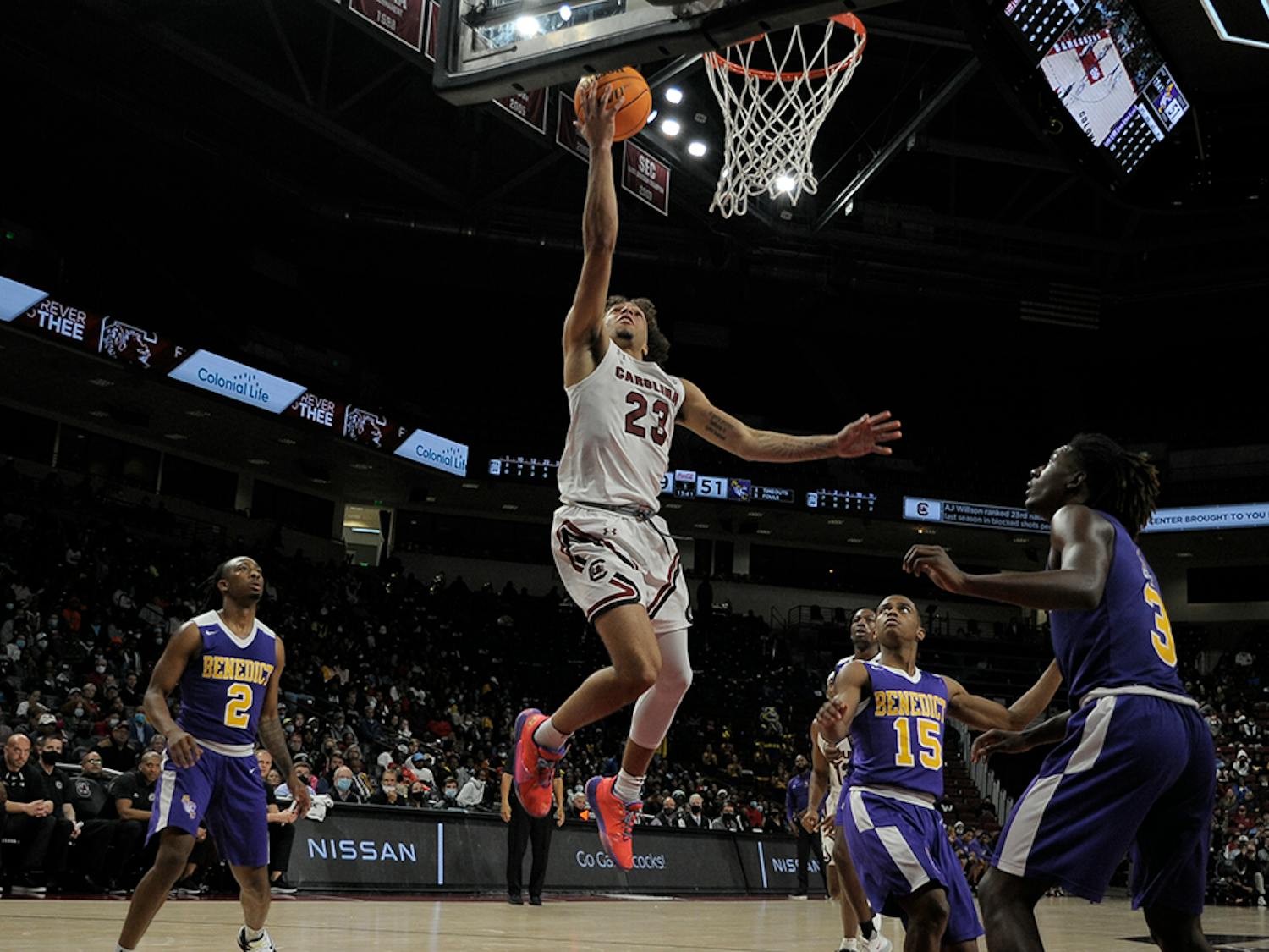 Freshman guard Devin Carter lays-up the ball in the second half against the Benedict Tigers.