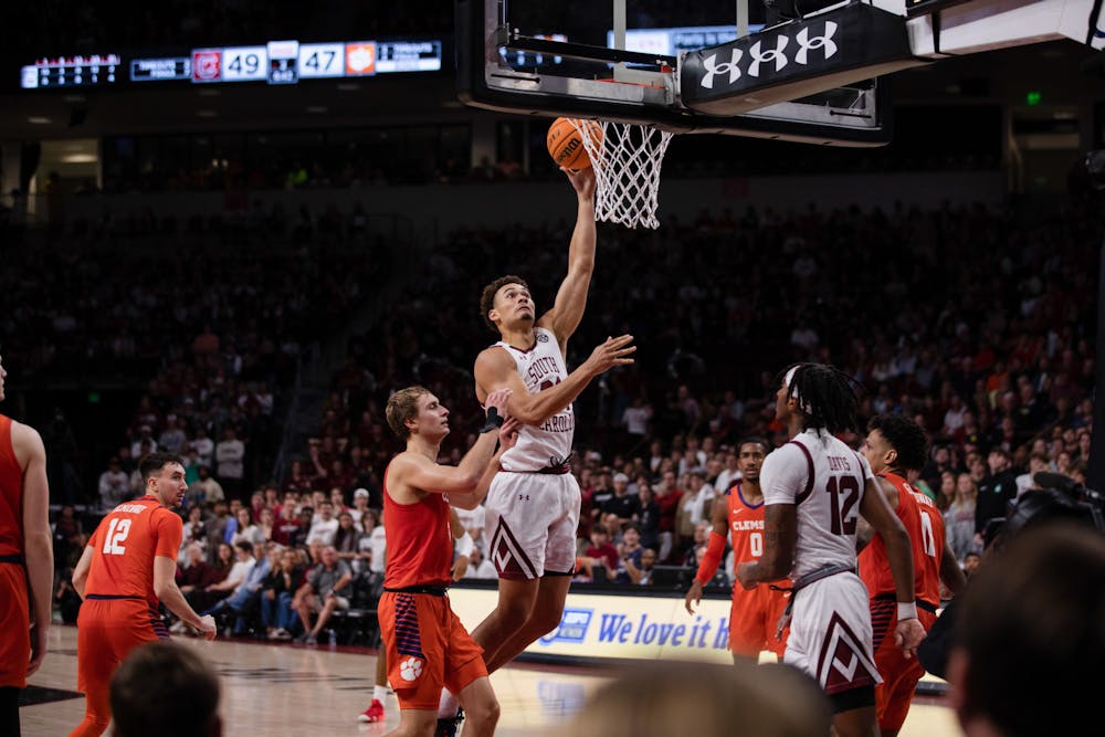 <p>FILE — Redshirt junior forward Benjamin Bosmans-Verdonk attempts a layup during a close game against Clemson on Nov. 11, 2022. The Gamecocks beat the Tigers 60-58.</p>