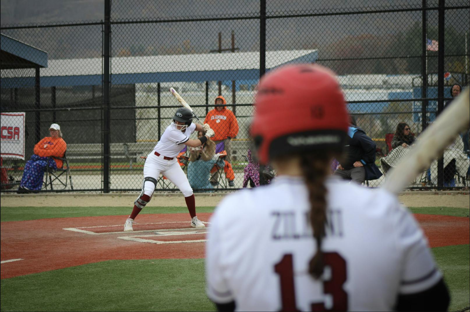 First baseman Katie Ziliani watches Outfielder and first baseman Hayley Belli prepare to bat during South Carolina Club Softball's game against Clemson on Nov. 10, 2024. The Gamecocks defeated the Tigers 12-11.