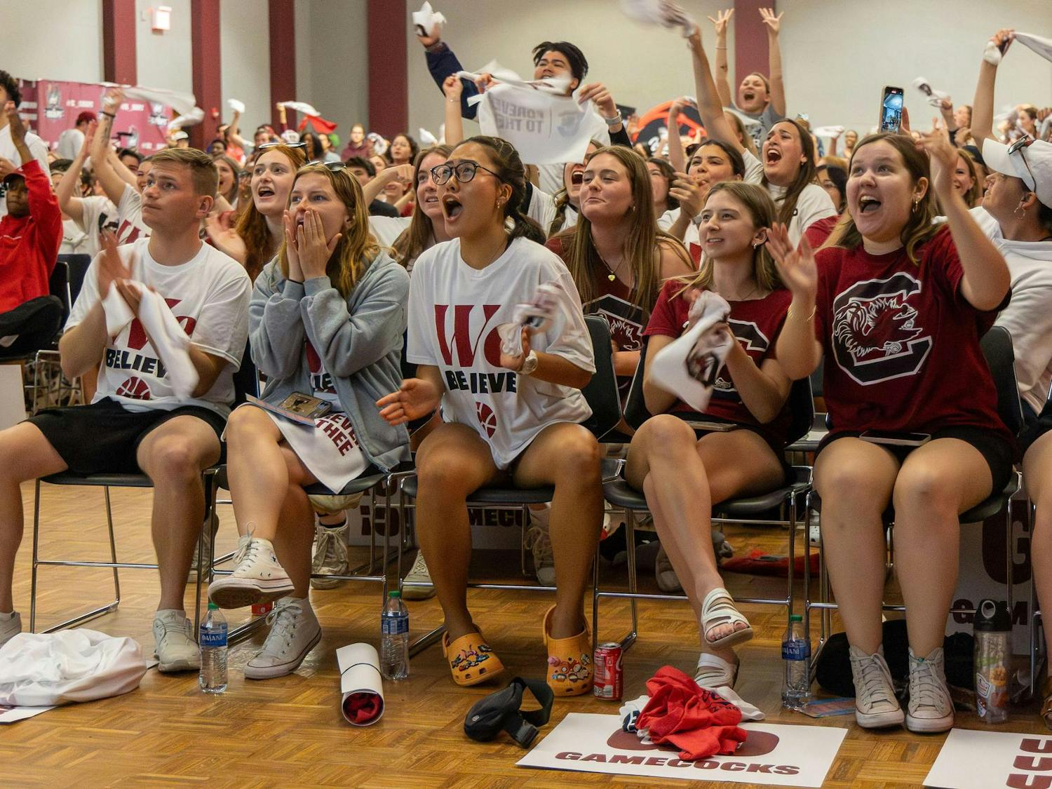 University of South Carolina students gather in the Russell House Student Union to cheer on the Gamecock women's basketball team as it competes in the final round of the NCAA Women's Tournament against Iowa on April 7, 2024. The Gamecocks capped off an undefeated season with an 87-75 victory over the Hawkeyes.