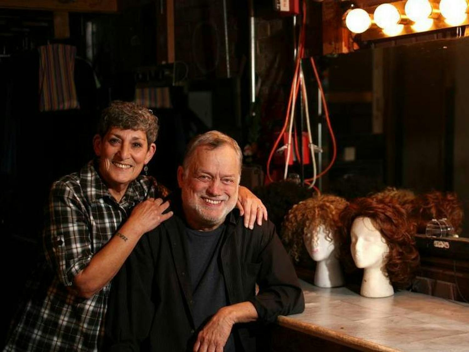 Photo of Jim and Kay Thigpen sitting backstage at Trustus