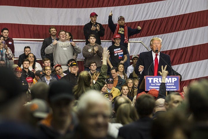 Presidential hopeful Donald J. Trump addresses economic concerns and answers audience questions at the T. Ed Garrison Arena in Clemson, South Carolina.