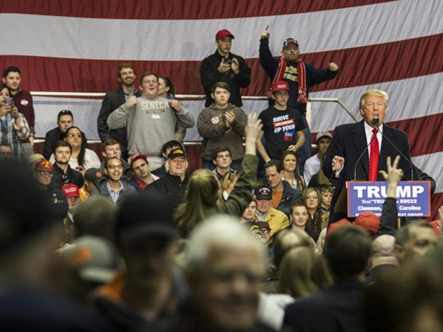 Presidential hopeful Donald J. Trump addresses economic concerns and answers audience questions at the T. Ed Garrison Arena in Clemson, South Carolina.