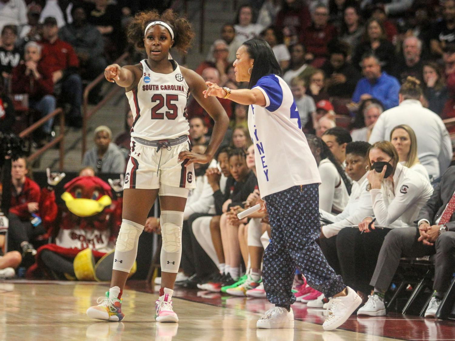 Redshirt freshman guard Raven Johnson talks with head coach Dawn Staley during South Carolina’s game against South Florida in round two of the NCAA tournament at Colonial Life Arena on March 19, 2023. The Gamecocks defeated the Bulls 76-45.&nbsp;