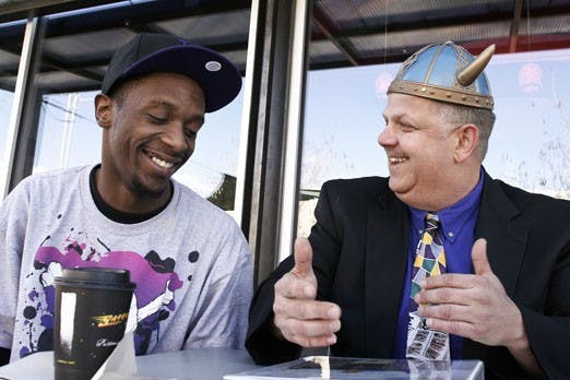 Luis Powell, left, and Stephen "HaHa" Hunt at Satellite Coffee on Wednesday.