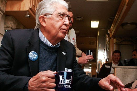 Frank Gamboa relates his experience in the Navy to fellow riders of the Straight Talk Express on Thursday. 