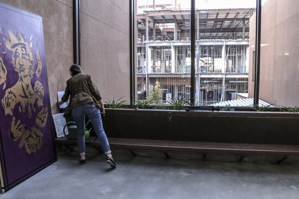 Construction on the new physics and astronomy building can be seen outside of the art building. Students report smelling chemical fumes that are causing nausea and headaches.