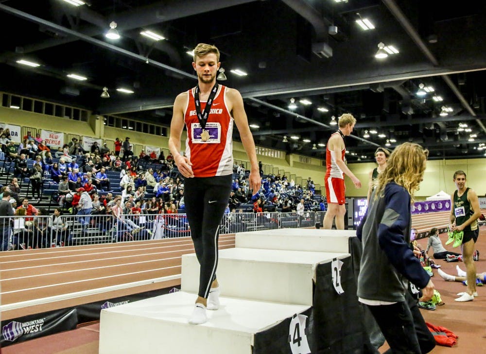 Josh Kerr walks off the podium at the Albuquerque Convention Center on February 25, 2017, after winning first place in the men's mile run in the MW Indoor Championship's. 