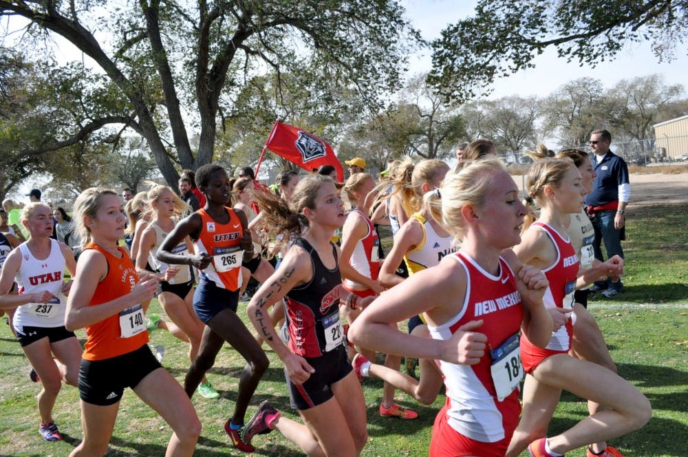 Callie Thackery (left) and Alice Wright lead the pack during the NCAA Championships in Albuquerque, New Mexico on Nov. 14, 2014. The Lobos dominated at the Wisconsin Adidas Invitational on Oct. 16, 2015.