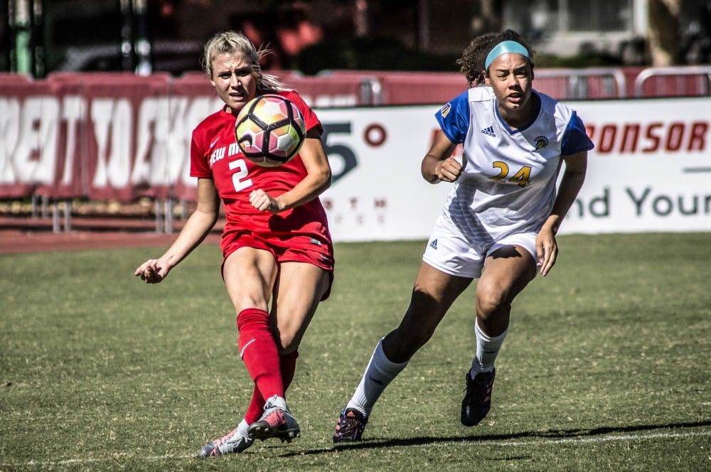 Jessica Nelson clears the ball as Kiara Parker of San Jos? State University contests at the UNM Soccer Complex on Oct. 8, 2017. UNM fell short with a 1-2 loss against SJSU.