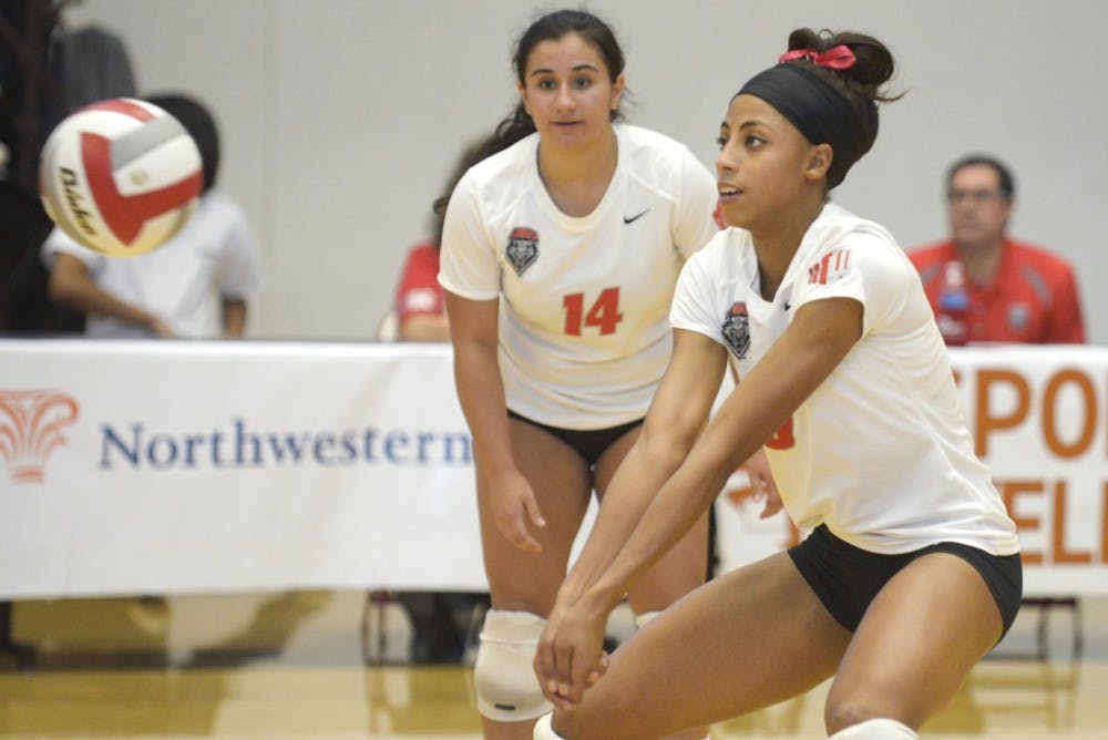 New Mexico right side hitter Chantale Riddle prepares to bump the ball during the game against San Diego State on Saturday. Riddle took sole possession of UNM’s point record during the Lobos’ 3-1 victory.