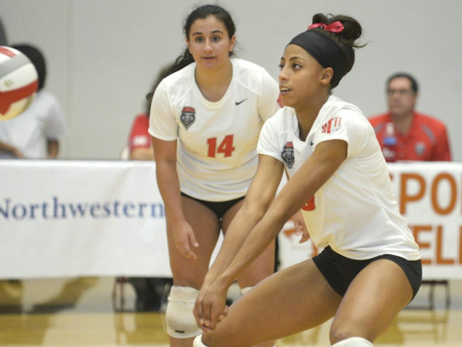 New Mexico right side hitter Chantale Riddle prepares to bump the ball during the game against San Diego State on Saturday. Riddle took sole possession of UNM’s point record during the Lobos’ 3-1 victory.