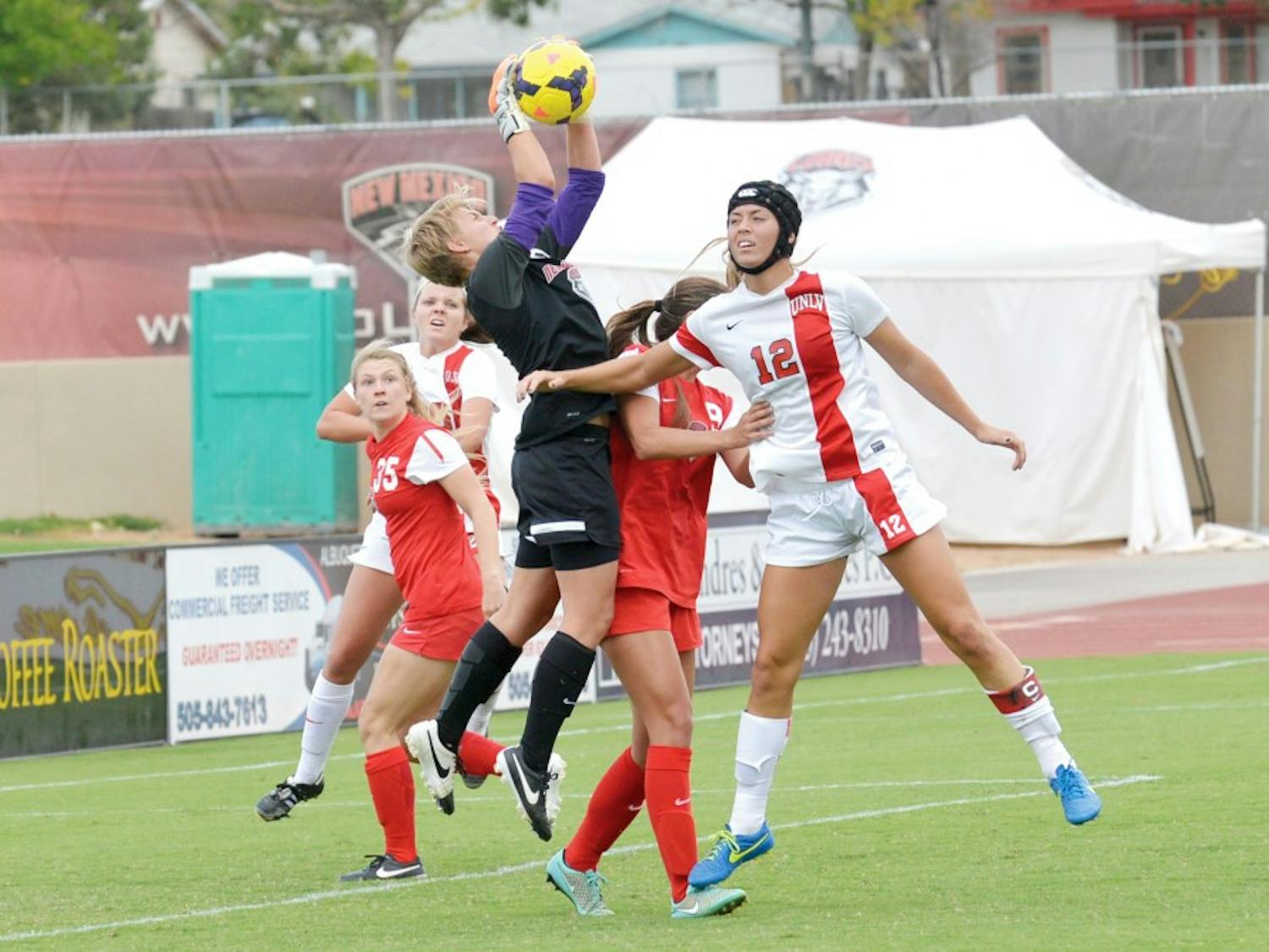 Lobo goalkeeper Cassie Ulrich grabs the ball away from UNLV’s offense during their game on Sunday. UNM is on the road playing Wyoming October 9.