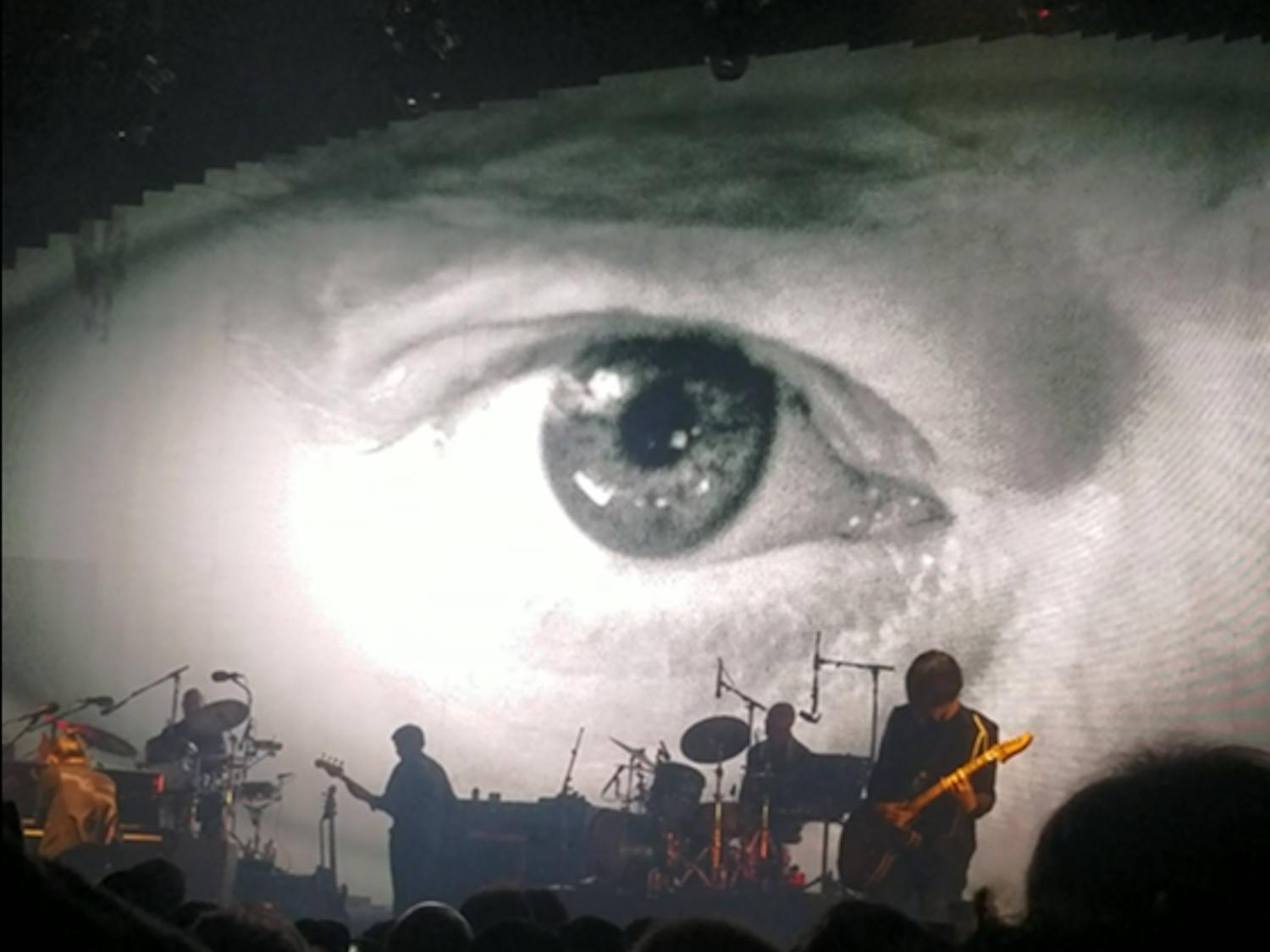 Thom Yorke's eye gazes into the crowd of the Santa Barbara Bowl during Radiohead's encore performance of "You and Whose Army?"