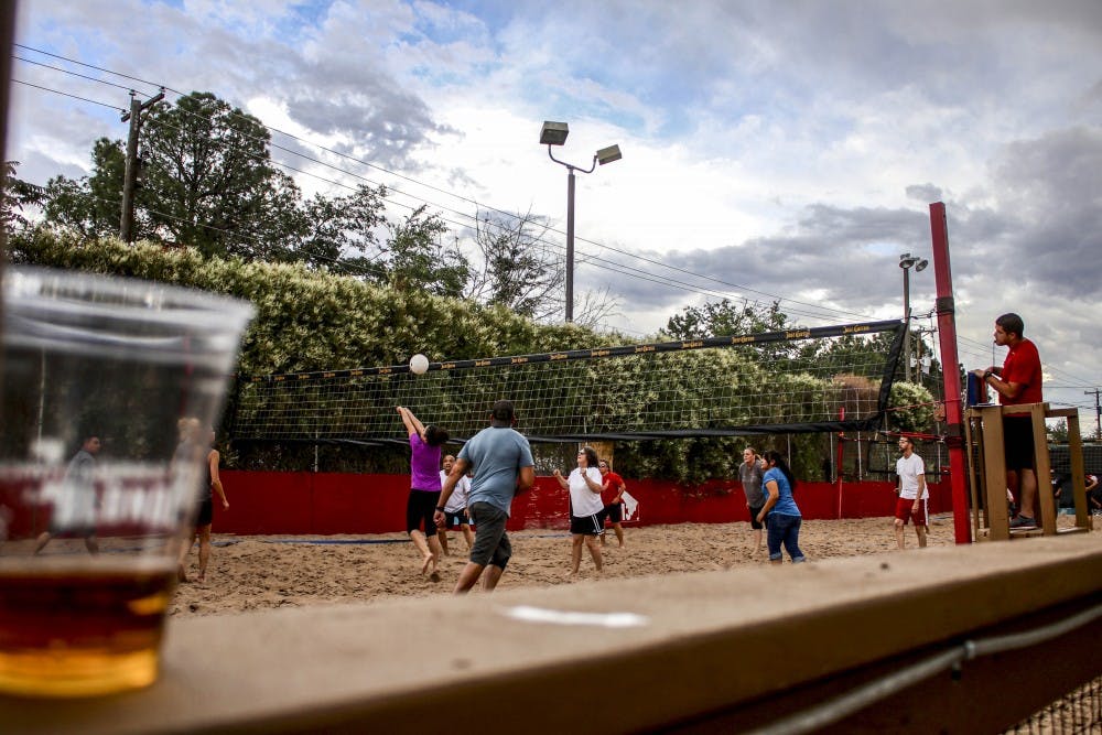Volleyball players enjoy the Sandbar?s volleyball court on Aug. 23, 2017. Players can reserve a spot to compete in volleyball league matches throughout the year. 
