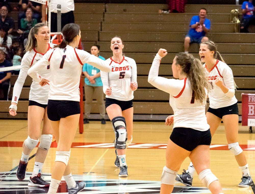 Lobos celebrate a kill against the UNLV Rebels on October 11th 2016 at Johnson Center