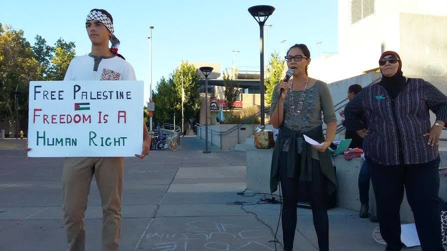 Saeed Assed (left), Melanie Yazzie (center) and Samia Assed participate at a Student Justice in Palestine organized demonstration in front of the UNM BookStore Oct. 14, 2015. A recent letter was sent to President Bob Frank in regards to cutting funding from the Muslim Student Association and Student Justice in Palestine student groups.