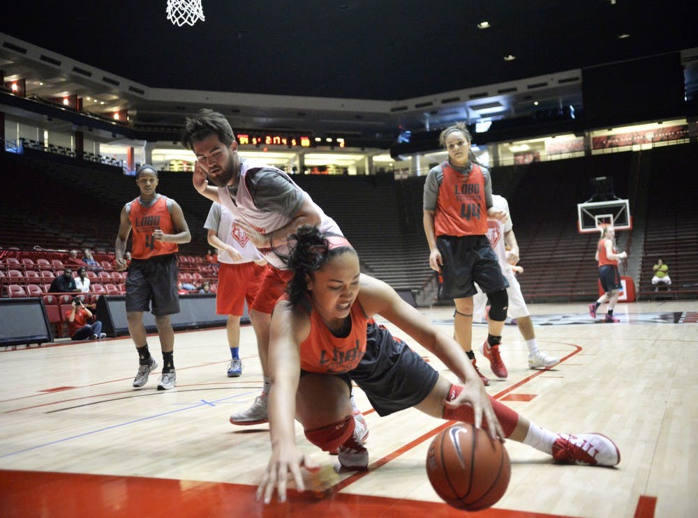 Sophomore guard Jayda Bovero fights for the ball during a scrimmage at WisePies Arena Saturday morning. The Lobos will have their first exhibition of the season Wednesday Nov. 4 at WisePies Arena.