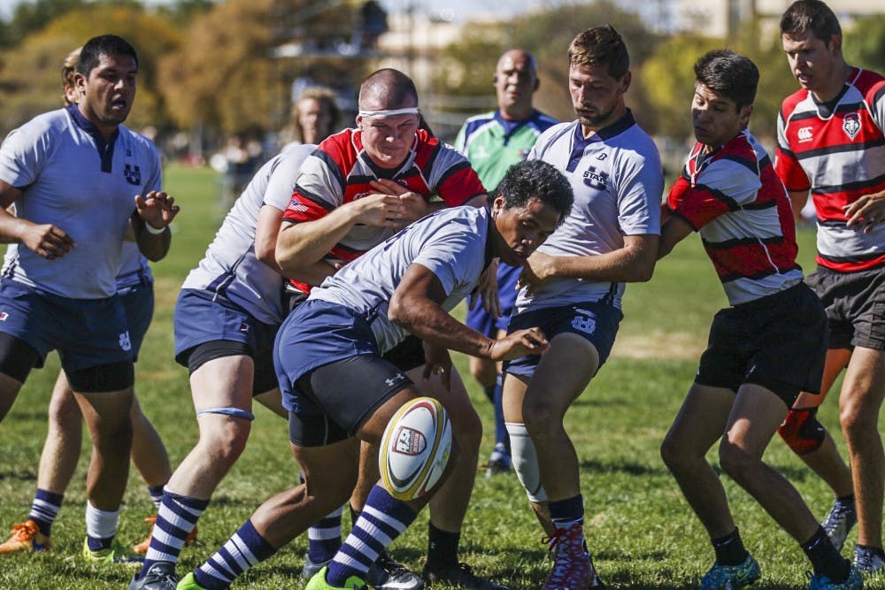 The UNM and Utah State rugby teams scramble for the ball Saturday, Oct. 22, 2016. The Lobos lost to the Aggies 54-16 which sets their season record to 0-3.&nbsp;