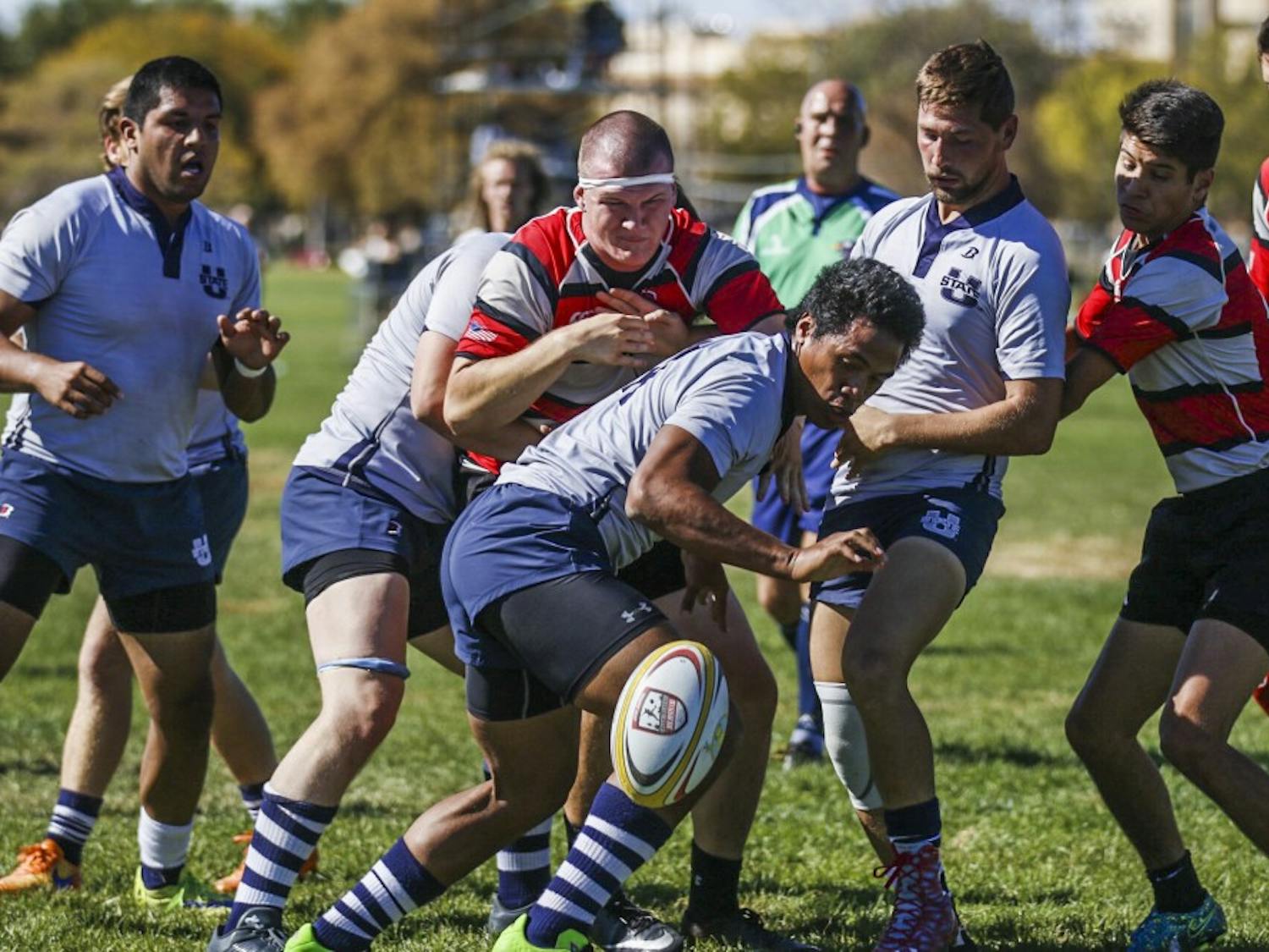 The UNM and Utah State rugby teams scramble for the ball Saturday, Oct. 22, 2016. The Lobos lost to the Aggies 54-16 which sets their season record to 0-3. 