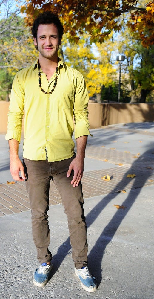 	Joel Bond, Sophomore, Exercise Science

	Shirt: Eddie Bauer, $40 
Necklace: Gift from girlfriend
Pants: Levi’s, $60
Shoes: Unknown, $30 

	“I’m really into vibrant colors that stick out — stuff that people will look at and be like, ‘What is that guy wearing? What is he thinking?’”

	Joel’s fashion mixes the polish of a button-up shirt with a destructed pair of shoes, resulting in the perfect fusion of old-fashioned debonair and modern edge. He said his fashion arises from magazines like GQ and his time spent working at Urban Outfitters. However, he said the majority of his fashion choices mix the feel of his youth while cultivating a mature look. 

