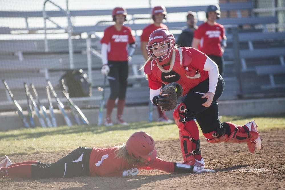 Sophomore catcher Chelsea Johnson makes a play during the Lobos' first practice of the season Monday, Feb. 8, 2016&nbsp;at Santa Ana Star Field. The Lobos won three out of five games during the UC Davis Tournament this past weekend in Davis, California.&nbsp;