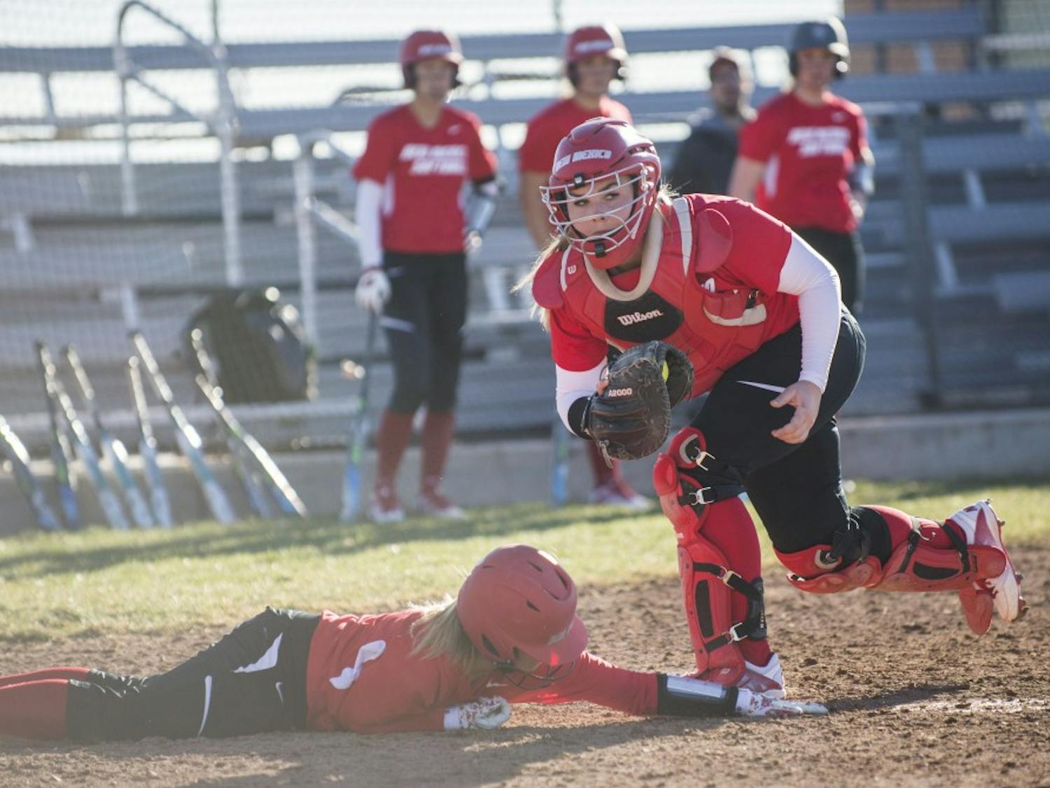 Sophomore catcher Chelsea Johnson makes a play during the Lobos' first practice of the season Monday, Feb. 8, 2016&nbsp;at Santa Ana Star Field. The Lobos won three out of five games during the UC Davis Tournament this past weekend in Davis, California.&nbsp;