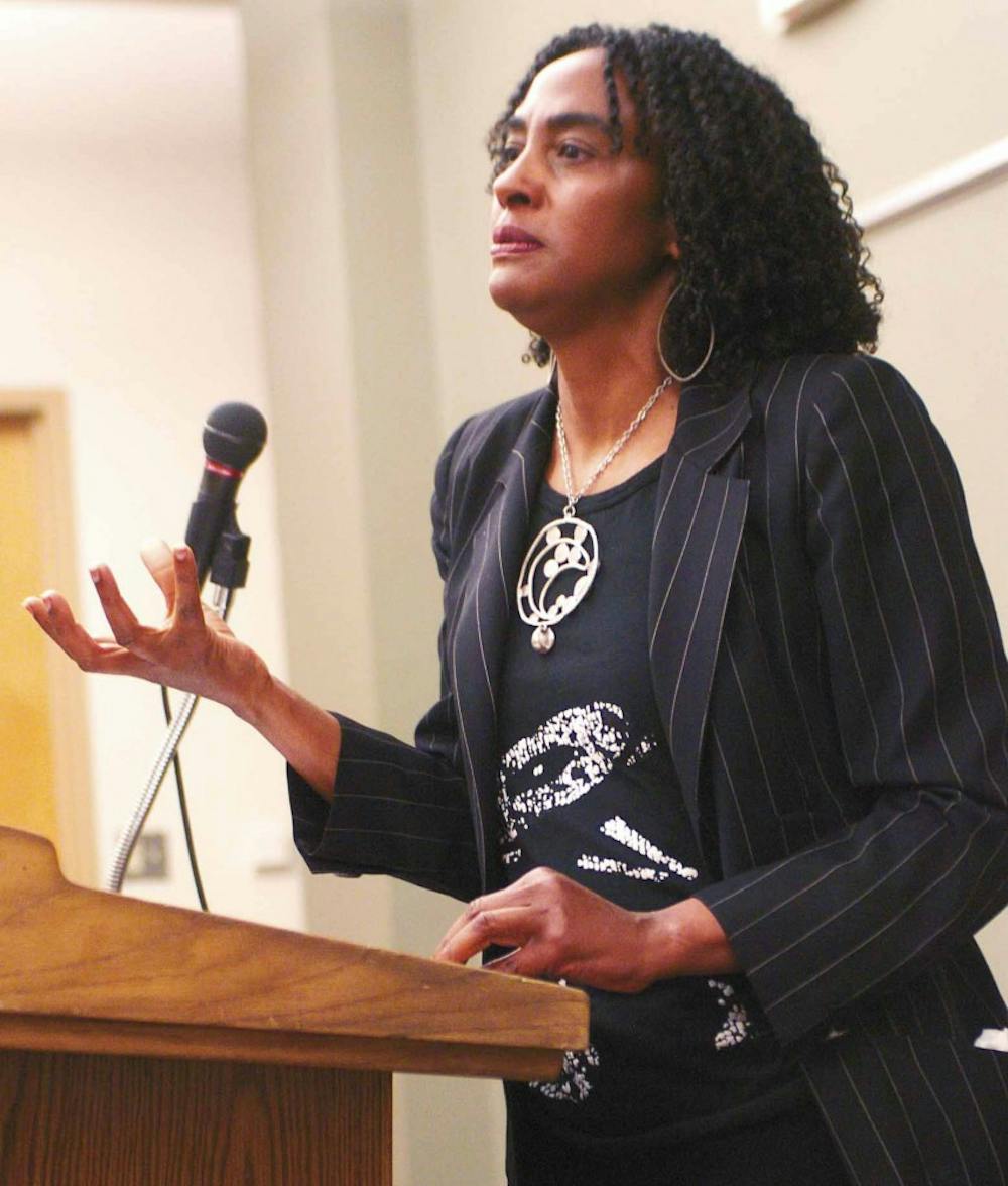 Loida Maritza Perez explains a poem by Paula Gunn Allen before reading it at the SUB on Friday during the Paula Gunn Allen Benefit weekend. 