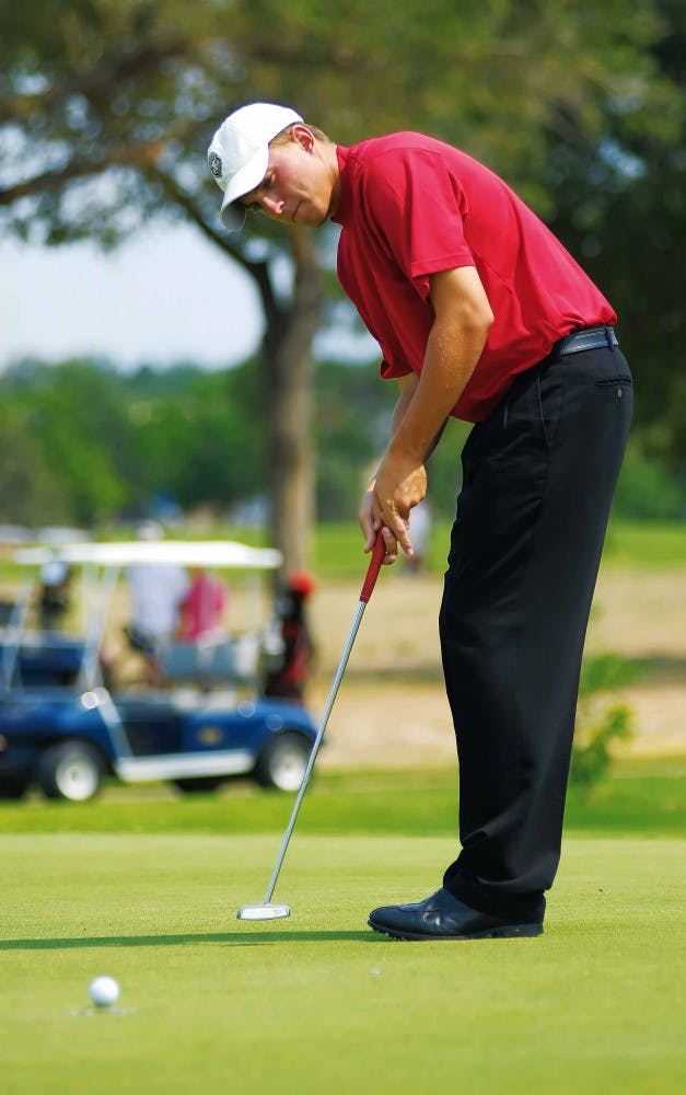 Golfer Steve Saunders watches his putt go in the hole for a par on the 10th hole at Los Altos golf course during the Albuquerque Men's City Amateur Golf Champions on July 8. 