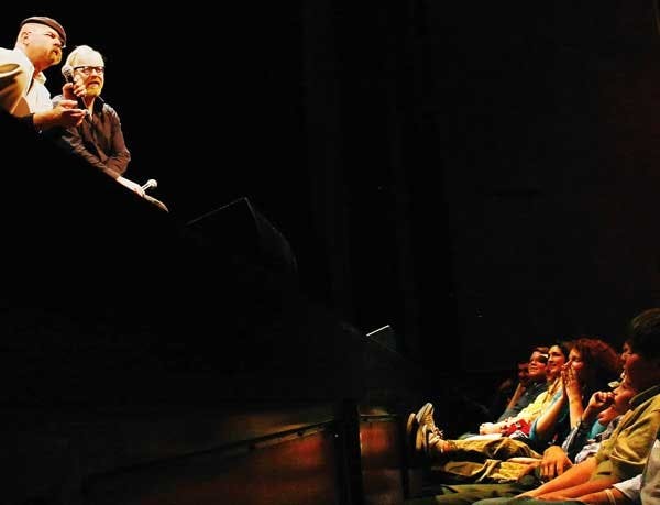 Jamie Hyneman, left, and Adam Savage, hosts of Discovery Channel's "MythBusters," speak to audience members during a presentation at Popejoy Hall on Saturday. 