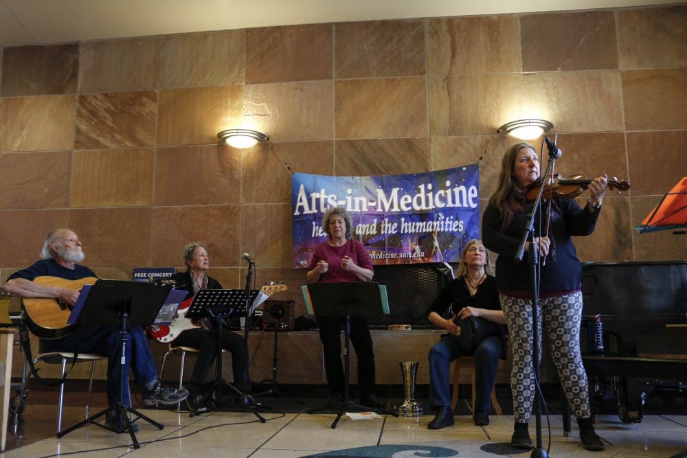 Goddess of Arno plays at UNMH by the BBR Pavilion Café on Jan. 31, 2018 as part of the Arts-in-Medicine concert series.